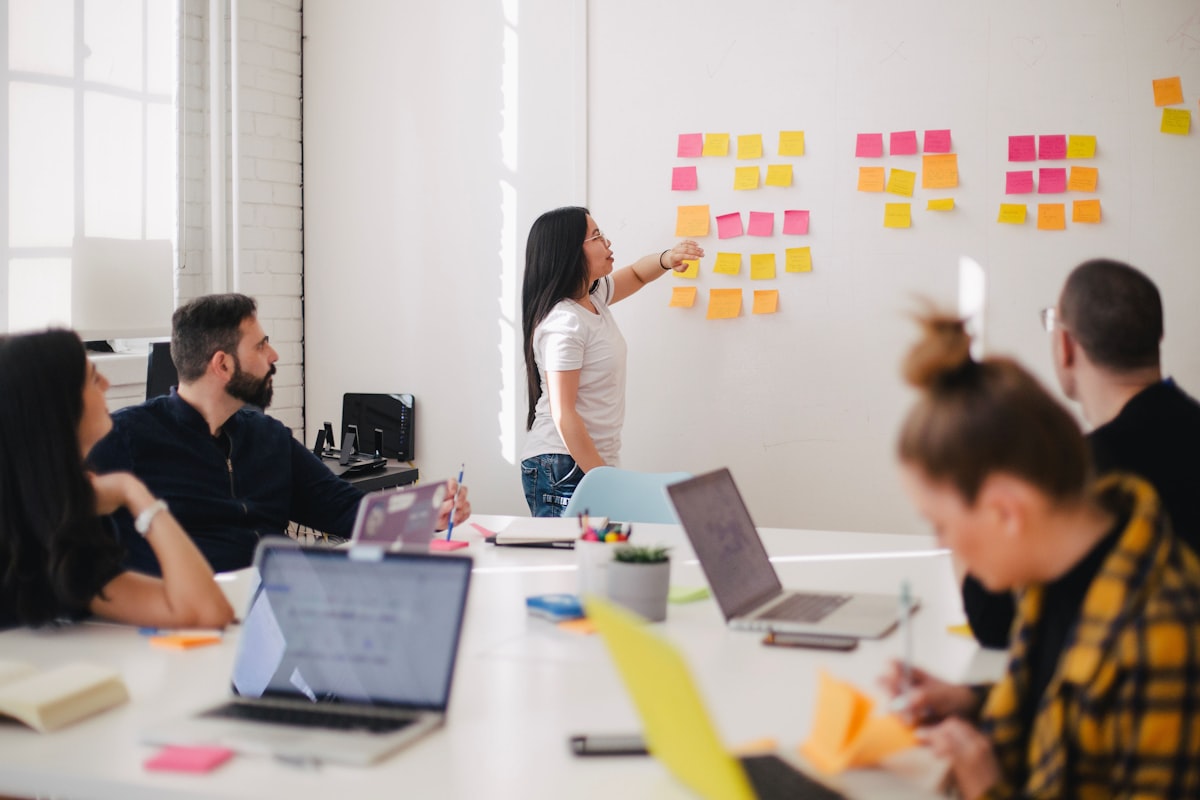 Business professionals collaborating on optimization strategies